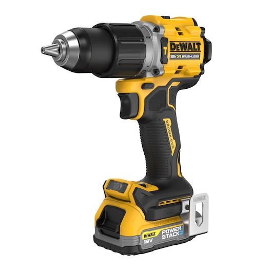 A yellow and black DEWALT cordless drill with an 18V XR brushless motor and POWERSTACK battery, designed for professional use, shown against a white background.