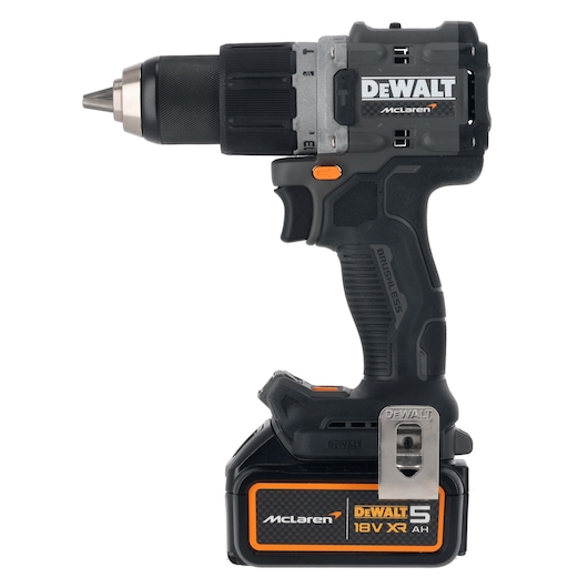 A DEWALT 18V XR cordless drill with a 5AH battery, featuring McLaren branding and a black and orange design. The drill has a metal belt clip and textured grip.