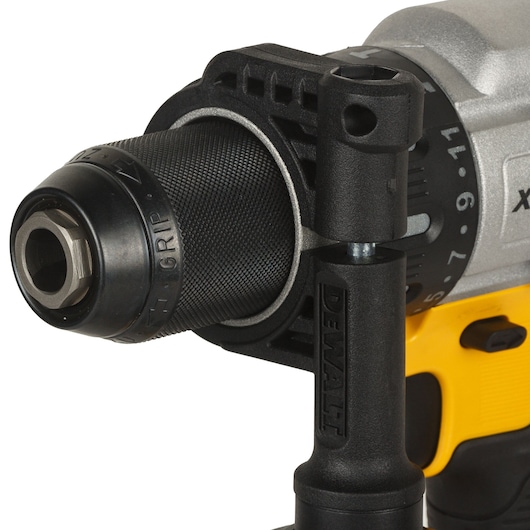 Close-up of the front section of a DEWALT cordless power drill, showing the textured grip, adjustable chuck, auxiliary handle, and part of the yellow and black body.