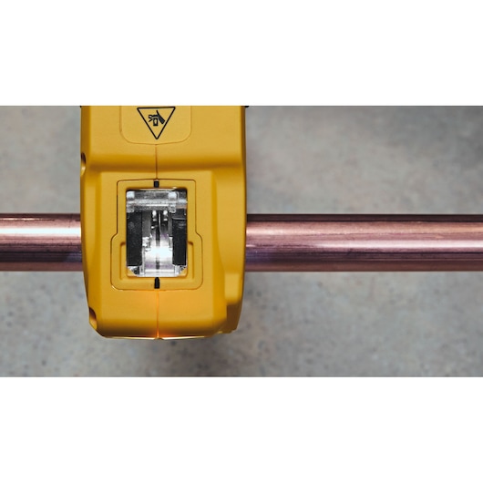 DEWALT Photography tool DCE154N, DCE154N-XJ clamped around a copper pipe, close-up view.