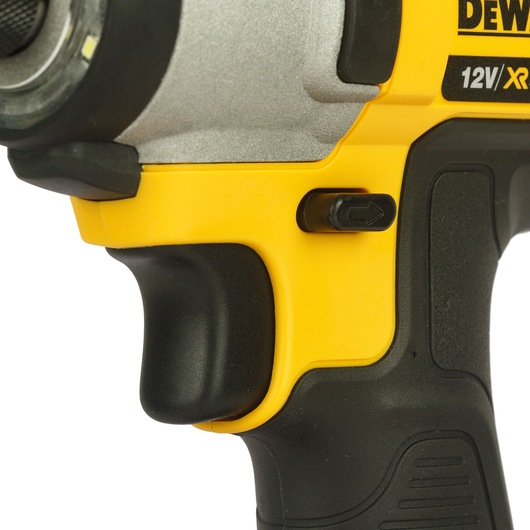 Close-up of a DEWALT 12V XR cordless power tool with yellow and black casing, showing the handle, trigger, and direction switch.