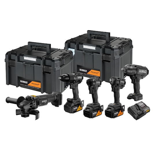 DEWALT tool set with four power tools, charger, and two black storage cases.
