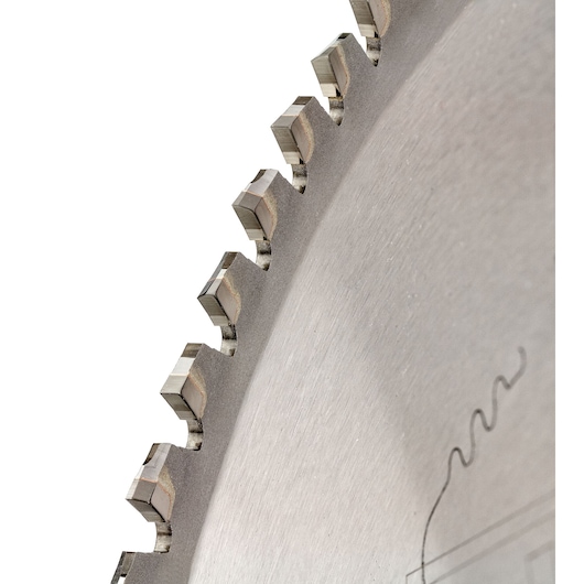 Close-up of a DEWALT circular saw blade showing sharp teeth and metal surface detail.