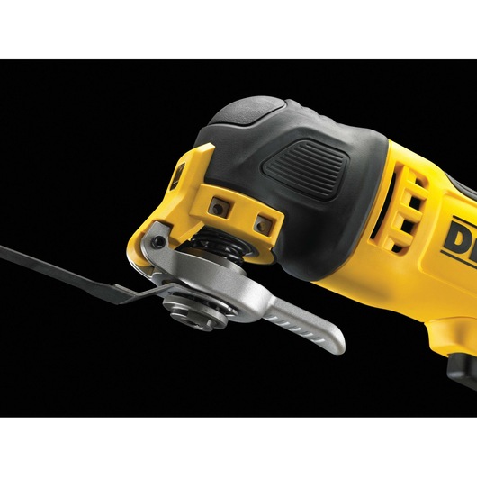 Close-up of DEWALT DT20704 oscillating multi-tool cutting blade attachment against a black background.