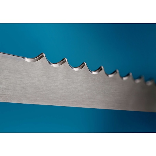 Close-up of a metal saw blade with serrated teeth against a plain blue background.