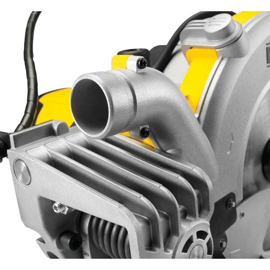 Close-up of a DEWALT miter saw component with metallic parts and yellow accents on a white background.