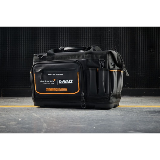 DeWALT McLaren tool bag with multiple pockets for storage and water-resistant compartments.